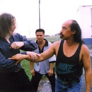 Al Leong right and Michael work out fight choreography on the Kung Fu The Legend Continues set 1995