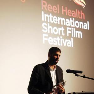 Accepting the Grand Prize for the Best Film of the Festival at the Reel Health International Short Film Festival