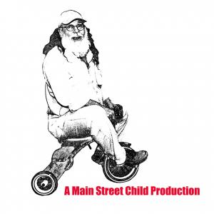 Michael Beeler posing on the tricycle in the iconic image of A Main Street Child Production.