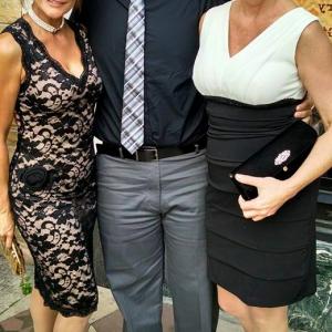 Brandon Seth Chinault (center) with fellow film stars Irene Santiago (left) and Rebecca Rogers (right) at the premiere of Badge of Faith (2015).