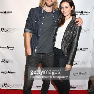 Actorwriter Geordie Robinson and actressdirector Emily Somers walk the red carpet of the Progression Foundation Fundraiser at Burton  Channel Islands store on May 21 2015 in Los Angeles California