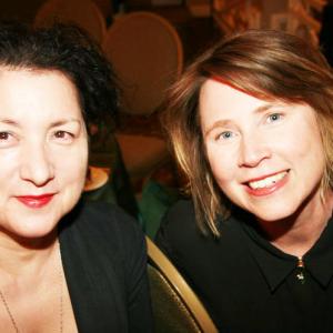 Charlene Rooney (left)accepting the Living Legacy Award - Fine Arts from the Women's International Center 2014