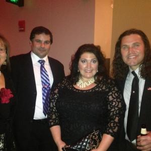 Lorna J Brunelle and husband Roger with Carlos Arrandando at an event in Boston
