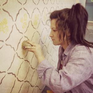 Catherine Bushell, stencilling and potato stamping the walls for 