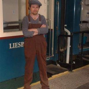 Dressed as a porter on an Adler clothing commercial