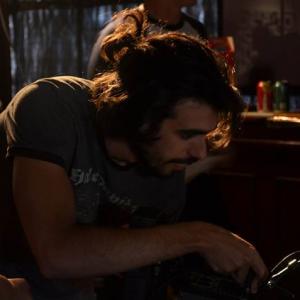 lvaro Ortega operates the camera as the Cinematographer of the short film Rem 2014