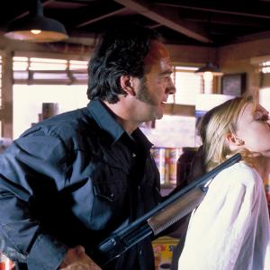 Still of James Belushi and Kylie Travis in Retroactive 1997