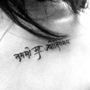 Lead me from darkness to light  Neck tattoo in Sanskrit Devanagari script Handwritten in stylized traditional style Unique personal authentic