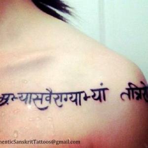 By practice and detachment they are stopped  Shoulder tattoo in Sanskrit Devanagari script Translated and Handwritten with a hint flowery modern touch Uses older version of one of the letters to give an antiquated feel Unique personal authentic