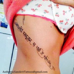 He protects you with his angels  Rib cage tattoo in Sanskrit Devanagari script Translated and Handwritten in modern exaggerated curves style Unique personal authentic
