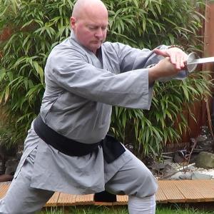 ADAM RICHARDS FIGHT DIRECTOR FILMING CHINESE BROADSWORD ON SET