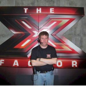 Here is a photo of me in KC working on X Factor I was registering contestants for the compitetion The main producter from the UK showed up I helped line up a shot for him There was an usual amount of contracts i had to sign to work on this This is th
