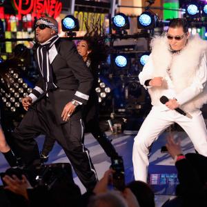 MC Hammer and Psy perform onstage at Dick Clarks New Years Rockin Eve with Ryan Seacrest