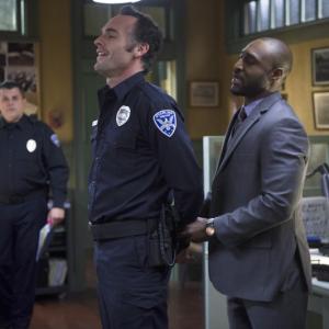 Still of Paul Blackthorne and Adrian Holmes in Strele 2012