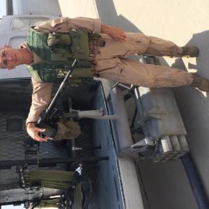 Flying on Huey as a door gunner director Clint Eastwood on American Sniper
