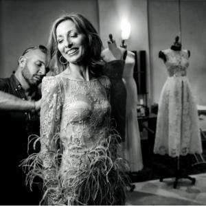 Fashion Designer Alex Perry fits Linda in one of his creations.