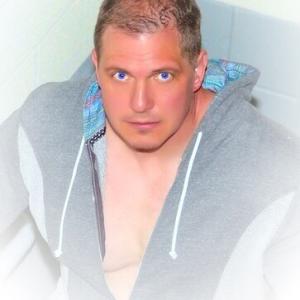 I just love his blue eyes and heart of gold. The other half of Lions Dream Productions Inc. My husband, Christopher.