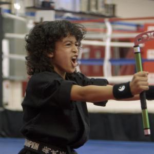 Still of Nassim Lahrizi in The Martial Arts Kid 2015