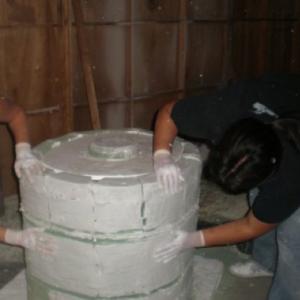 Alexa and Marissa plaster the Indiana Jones altar