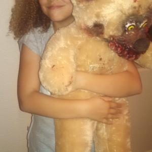 Tiana and the monster teddy bear.