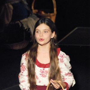 Bonnie Ferguson as the rose seller in 