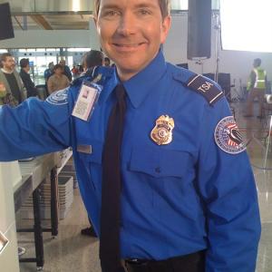 David Schifter as TSA Officer Robinson in Homeland Security Training module