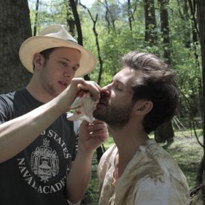 Tyler putting some blood gel on Zane Stephens face during 