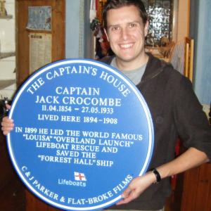 Louisa A Winters Tale screenwriter ADRIAN TYSON proudly holding a Blue Plaque erected at Jack Crocombes house in October 2010