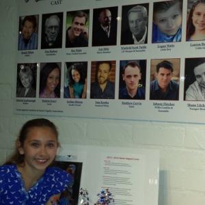 Lauren under the cast poster with her picture in Performance Riverside's production of Ragtime
