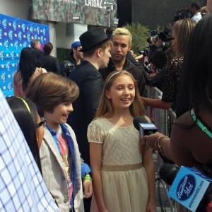 Lauren being interviewed on the red carpet at the American Idol finale