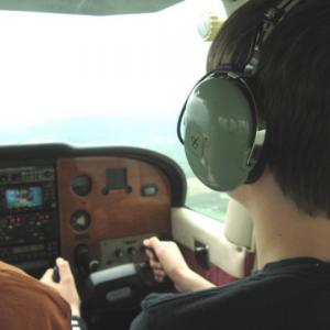 Aidan Roth piloting a plane