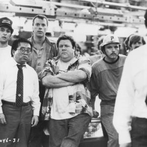 Still of John Turturro, George Wendt, Clint Howard, Rodney Kageyama and Rick Overton in Gung Ho (1986)