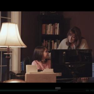 Portraying the Mom on screen yet also the narrator of the film A Curious Breed by Luke Harvey