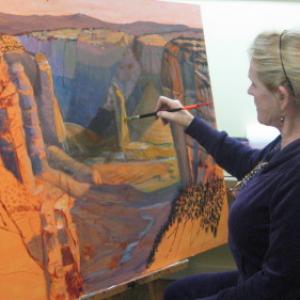 Kathaleen Brewer working on Canyon De Chelly paintng