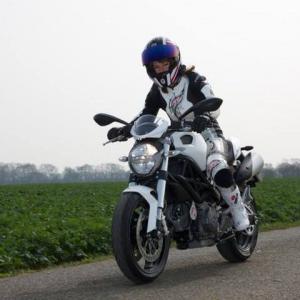 Riding her Ducati Monster
