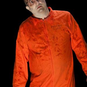 I was portraying a psycho ward patient at Six Flags Fright Fest.
