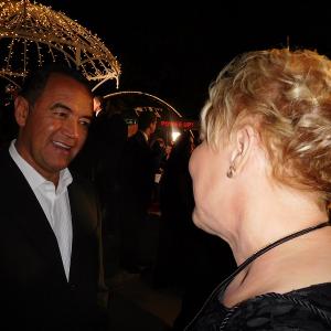 Dr Diane Howard interviewing George Parra Producer of Joy on red carpet as interviewer journalist at the 24th Movieguide Awards Gala 2016