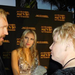 Interviewing David R. White (Pure Flix CEO and actor) and wife Andrea Logan on red carpet at Movieguide 24th Annual Awards Gala, 2016, as interviewer and journalist