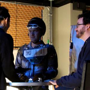 Alex Griffin, director, with actors Kelly Russo and Russell Nauman on the set of the live action/motion capture hybrid 'Some Like it BOT!'