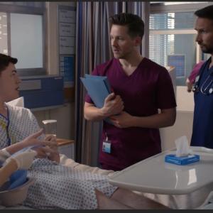 Max J Green as Stephen Holting in a scene with Alex Walkinshaw as Fletch, Kaye Wraggs as Essie and David Ames as Dom in Holby City. Episode Return to Innocence. S17 Ep 42 All time Episode Number 777