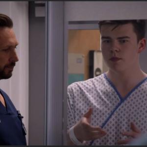 Max J Green as Stephen Holting in a scene with Angela Wynter as Ina Effanga and Alex Walkinshaw as Fletch in Holby City Episode Title Return to Innocence S17 Ep 42 All time Episode number 777