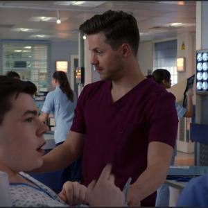 Max J Green as Stephen Holting in a scene with Kaye Wraggs as Essie and David Ames as Dom in Holby City. Episode Title Return to Innocence S17 Ep 42 All time Episode Number 777