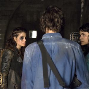 Still of Devon Bostick Eve Harlow and Marie Avgeropoulos in The 100 2014