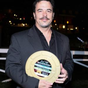 John Foutz at the Action on Film Awards Banquet at the Santa Anita Race Track with Award in hand