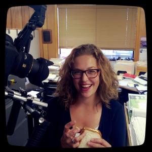 Cassandra, played by Angela Andrews, eating an egg salad sandwich in STILL: web series