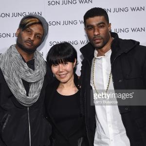 LR Singer Chosen Wilkins designer Son Jung Wan and singer Alvester Martin pose backstage at the Son Jung Wan fashion show during MercedesBenz Fashion Week Fall 2015 at The Pavilion at Lincoln Center on February 14 2015 in New York City