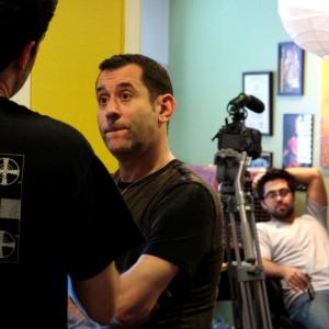 On set of The Man Who Loved His Cat Lee Sticker center with director Jay J Levy left