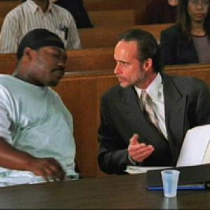 Carson Grant portrays Attorney Herb in the film Paper Soldiers directed by David Daniel  Damon Dash 2002 with actor Beanie Siegel in picture