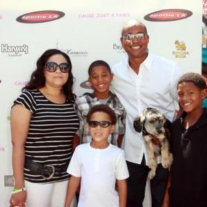 Derrex Brady and family at the Stars Cause Just Paws Event Kelly Kray Logan Julian and their dog Chase Brady