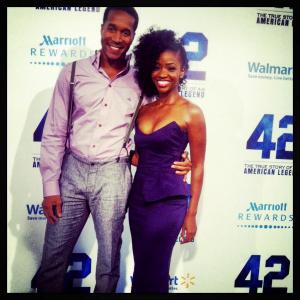 At the premiere of 42 with Teyonah Parris from Mad Men Styled by Kimberly Sheree in Vivienne Westwood and John Varvatos